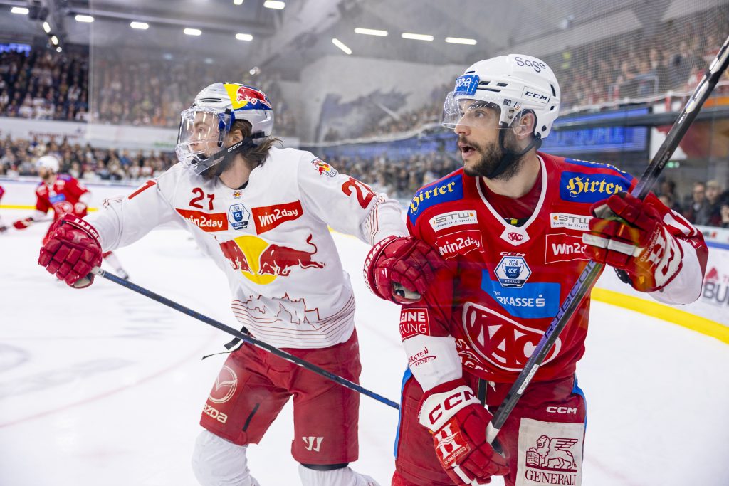 SALZBURG,AUSTRIA,16.APR.24 - ICE HOCKEY - ICE Hockey League, play off final, EC Red Bull Salzburg vs Klagenfurter AC. Image shows Troy Bourke (EC RBS) and Lukas Haudum (KAC). Photo: GEPA pictures/ Gintare Karpaviciute - For editorial use only. Image is free of charge.