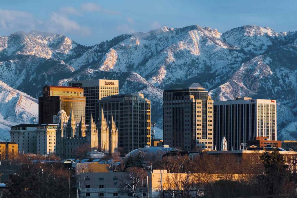 winter-scene-of-the-downtown-skyline-with-the-mormon-salt-lake-temple--backed-by-the-snowcapped-wasatch-mountains--salt-lake-city--utah--usa-533686504-5ad1364f18ba01003747bd7b